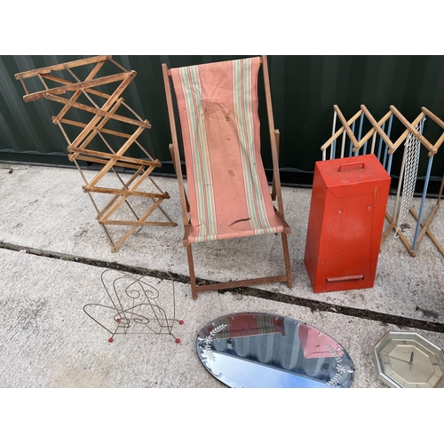 9 - A collection of vintage items including deck chair, two picnic baskets, bin, cat basket, mirror, mag... 