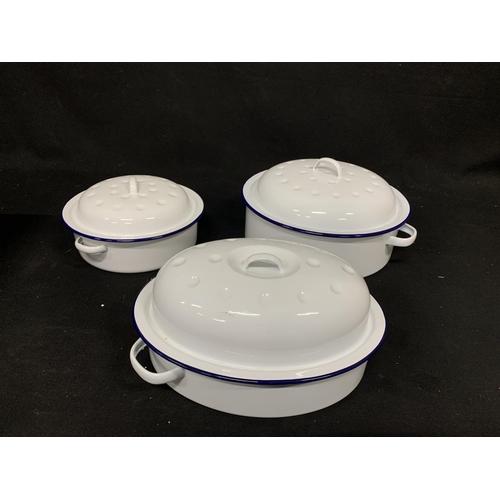 528 - 3 white enamel lidded pans, unused