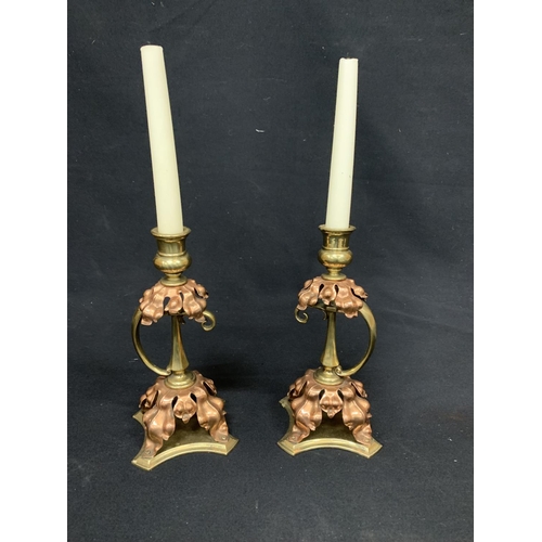 533 - Pair Art Nouveau copper and brass candlesticks, height 21cms