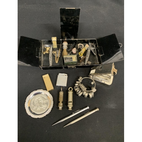 600 - 2 whistles, ring sizers and small metal items