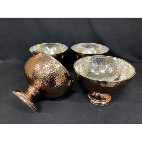 674 - Set of 4 copper effect bowls, diameter 32cms