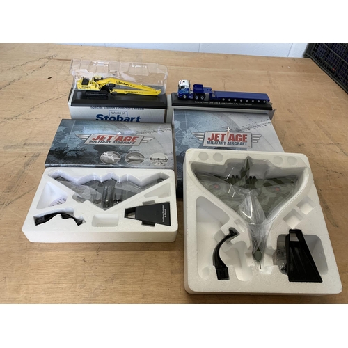 822 - Two Eddie Stobart collectors boxed  model vehicles and two boxed Jet Age Military Aircraft