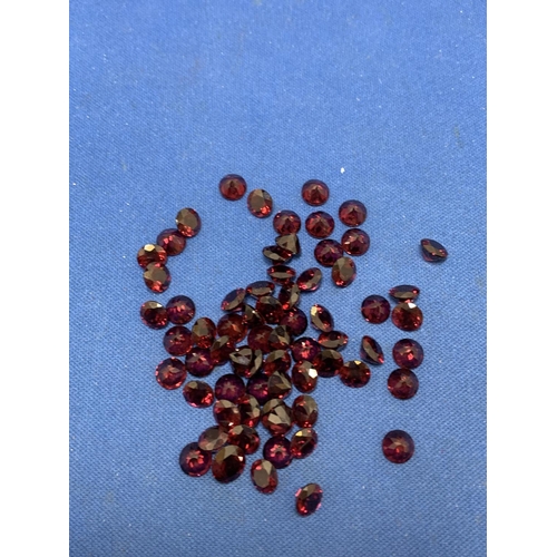 890B - A parcel of 67 Rubelite Garnets round cut 6mm top colour 73.45 total carats