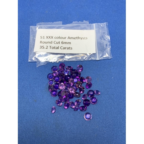 890C - A parcel of 51 XXX colour Amethysts round cut 6mm 35.2 total carats