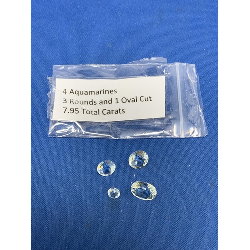 890D - A parcel of 4 Aquamarines 3 round cut and 1 oval cut assorted sizes 7.95 total carats