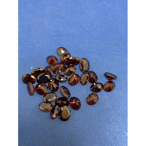 890H - A parcel of 29 Zambian Garnets Oval Cut 10 x 8 mm 62.94 total carats