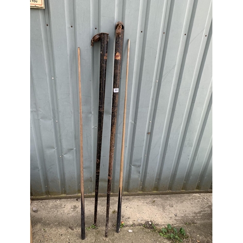 969 - Two old tin cased snooker cues