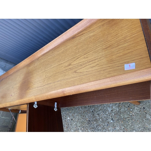 1 - A mid century teak cocktail sideboard by White and newton