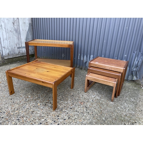 109 - A teak nest of three together with a teak tea trolley and a pine coffee table