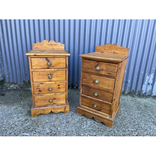 11 - A pair of country pine four drawer bedsides