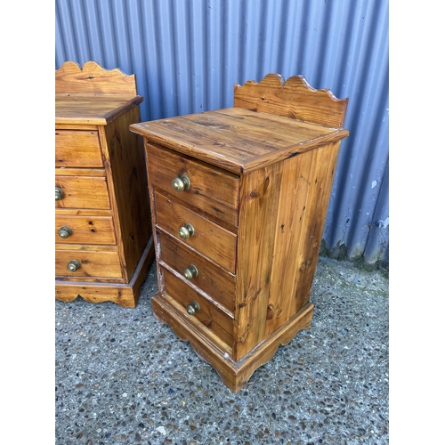 11 - A pair of country pine four drawer bedsides