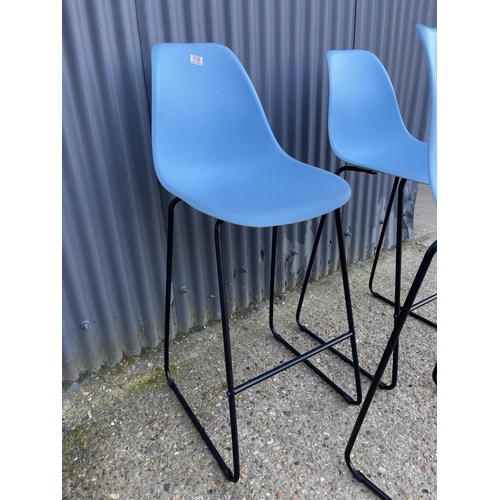 110 - A set of four modern metal framed bar stools with blue plastic seats