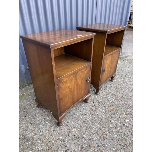 111 - A pair of walnut pot cupboard besides