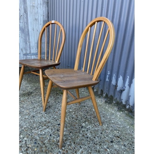 12 - A pair of ercol kitchen chairs