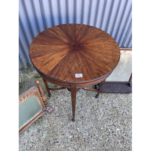 13 - A Victorian occasional table together with two swing mirrors