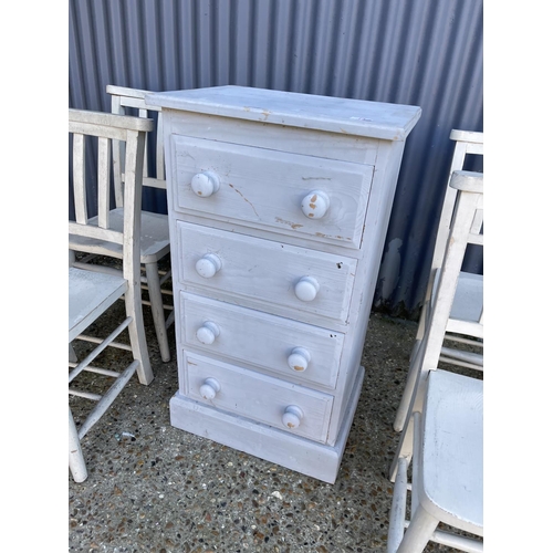 14 - A grey painted pine chest of four together with a set of four painted chairs