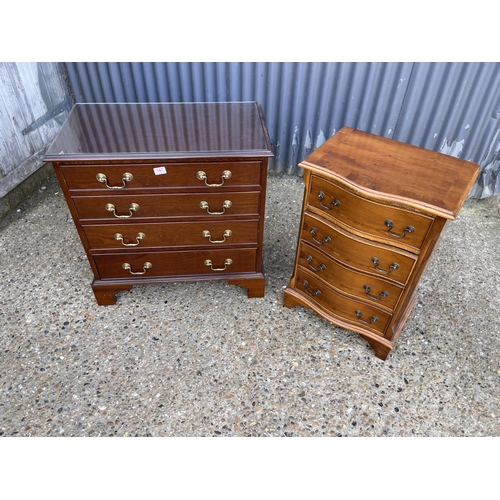 147 - A reproduction mahogany chest of four drawers together with a yew chest of four drawers