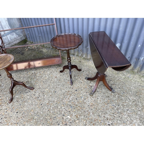 151 - A mahogany wall shelf, two wine tables, nest of three, side table and magazine rack