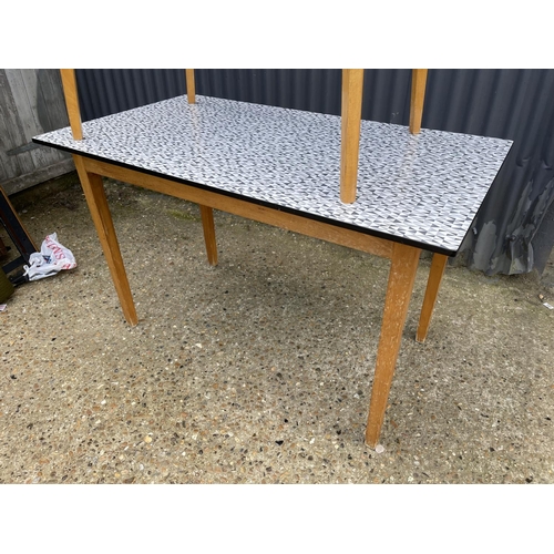 168 - Two rectangular formica topped kitchen tables