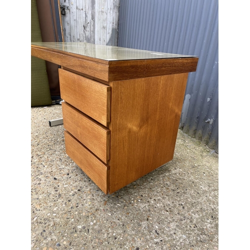 169 - A mid century teak and metal framed desk