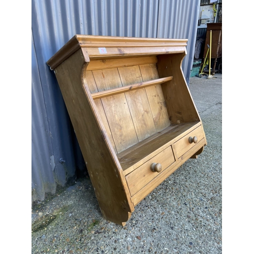 18 - A country pine two drawer wall shelf