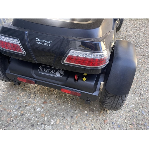 180 - A RASCALL VENTURA four wheel mobility scooter in full working order with key and charger. Only 70hou... 