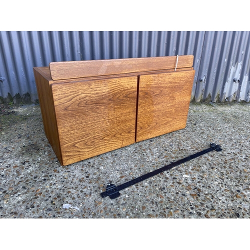 19 - A single teak wall box unit by TAPLEY with wall mount