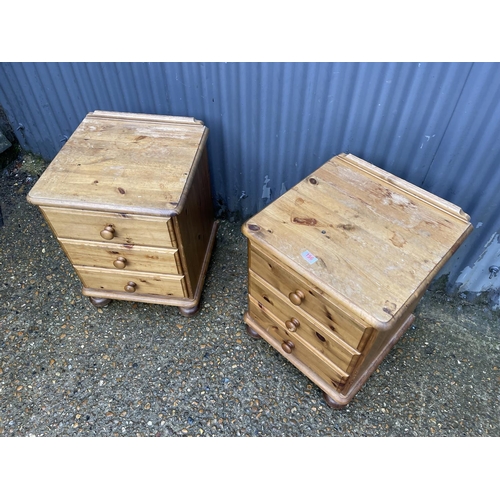 196 - A pair of modern pine bedside chests of three