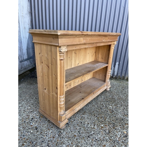 20 - A solid pine open fronted bookcase