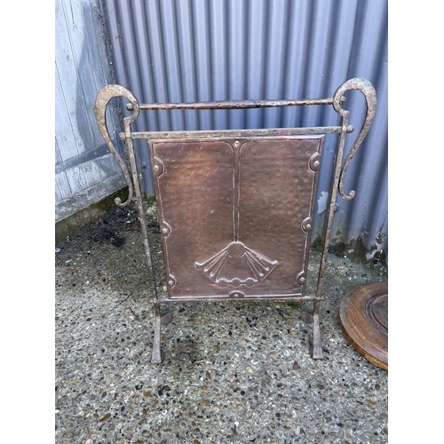 23 - A copper fire screen, retro side table and a standard lamp