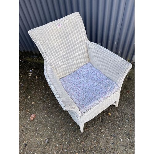 238 - A white painted lloyd loom bedroom chair