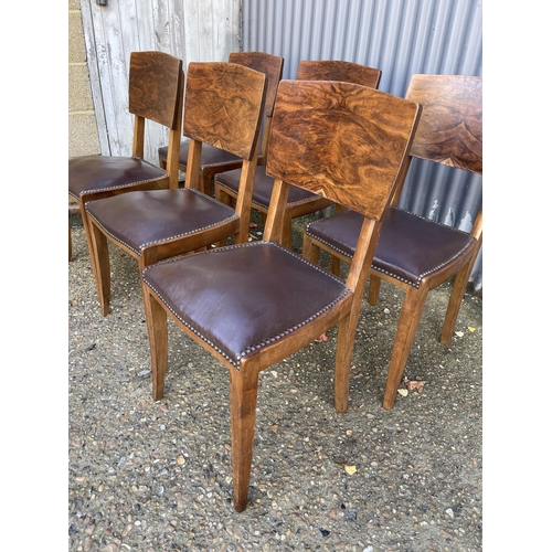 239 - A set of six deco style dining chairs with brown leather seats and brass stud work