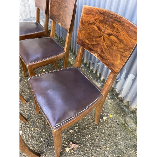 239 - A set of six deco style dining chairs with brown leather seats and brass stud work