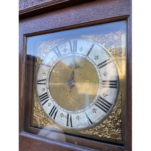 252 - An oak cased long case clock by JOHN COLLINS