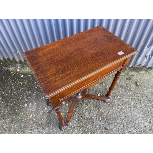 261 - An oak single drawer hall table