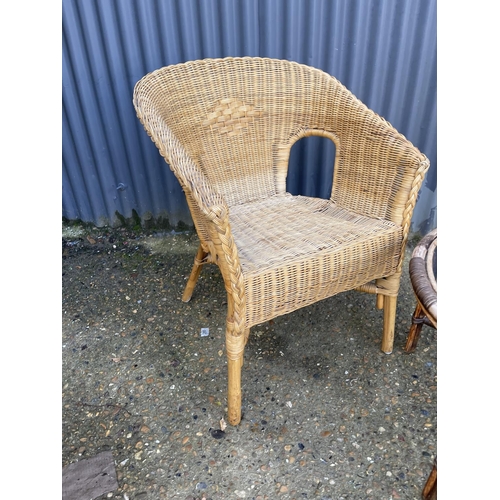 269 - A wicker chair and a bamboo coffee table