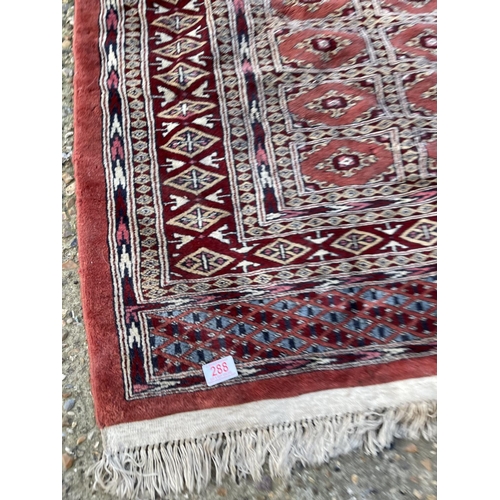 288 - A red oriental pattern rug 130x190