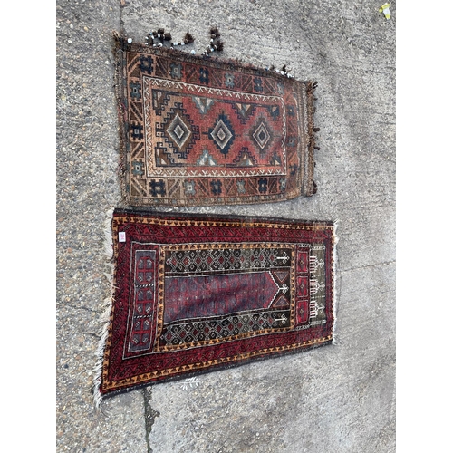 294 - Two oriental pattern rugs larger 130x70