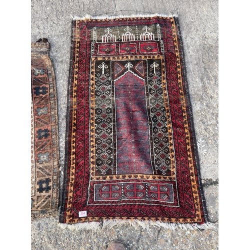 294 - Two oriental pattern rugs larger 130x70