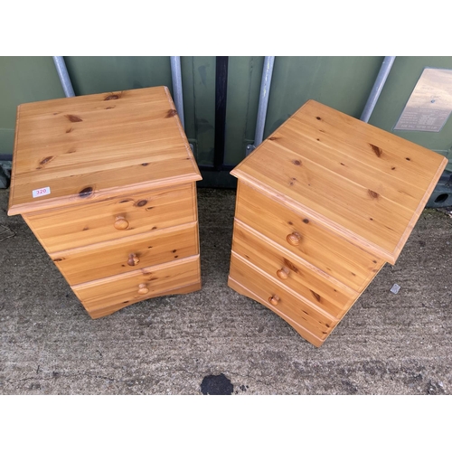 320 - A pair of modern pine bedside chests of three