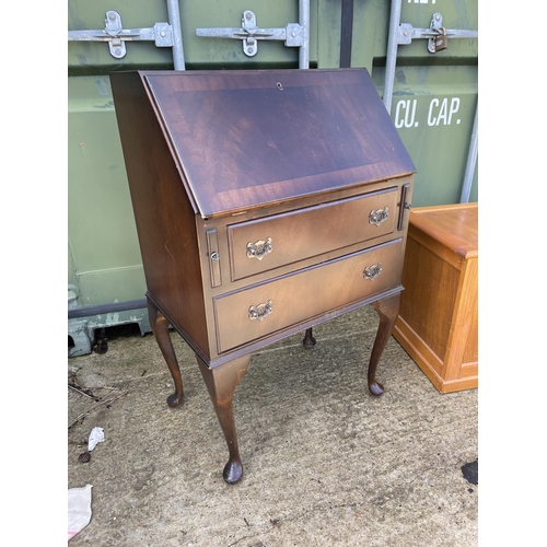 323 - An oak linenfold blanket box together with a mahogany bureau