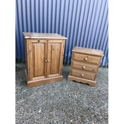 33 - A pine cupboard and a small pine chest of three