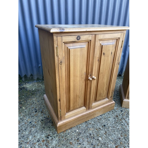 33 - A pine cupboard and a small pine chest of three