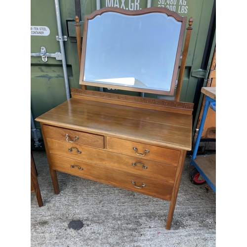 353 - An Edwardian mahogany bedroom pair consisting of a four drawer dressing chest together with a washst... 