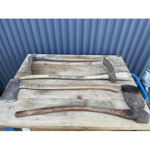 461 - Two antique axes and two mattocks