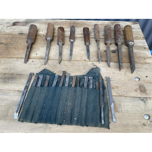 462 - Nine sorby carving chisels and roll of chisel blades