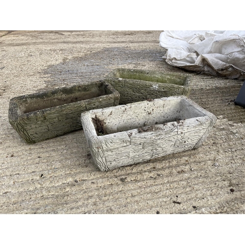 478 - A set of three rectangular concrete planters