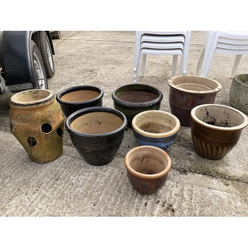 481 - Eight glazed garden pots and a strawberry pot