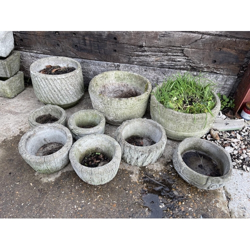 482 - Nine assorted concrete circular planters