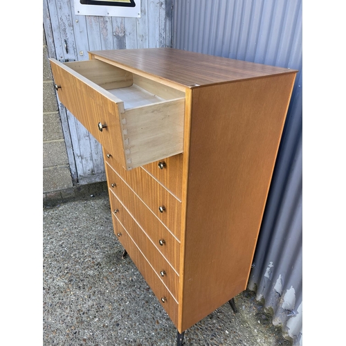 52 - A mid century teak tallboy chest of six drawers